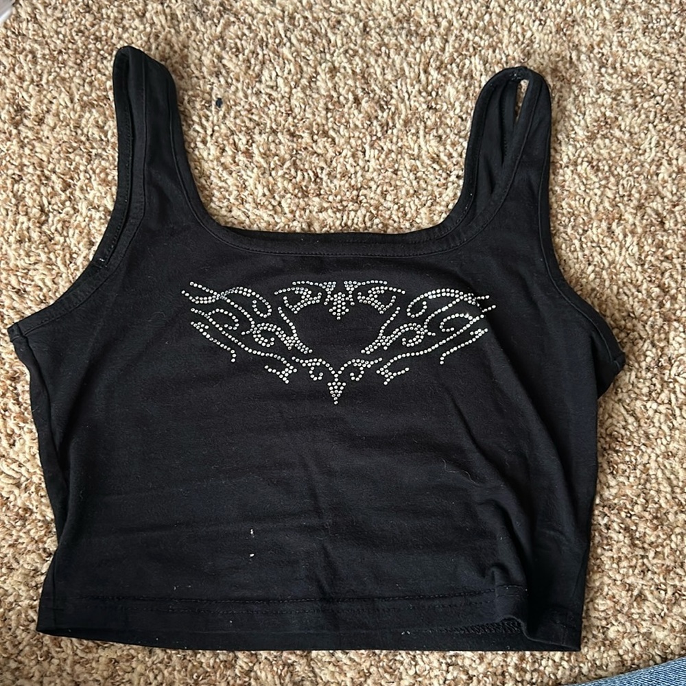 I’m selling a cute diamond heart black tank tip perfect for simple outfits.